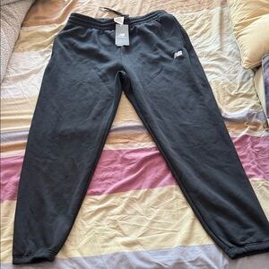 New Balance black relaxed fit sweatpant, size large